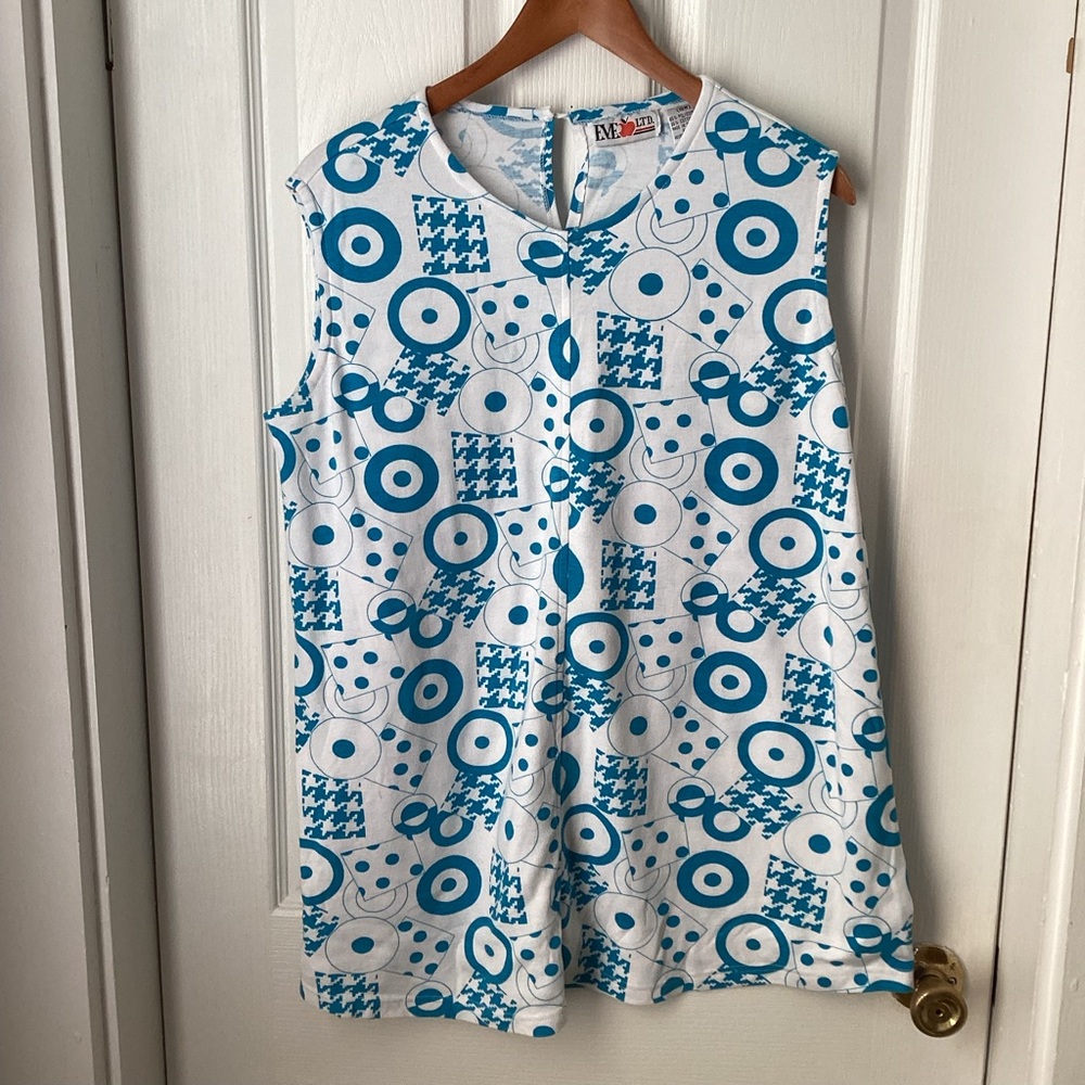 EVE LTD: white with blue circle pattern sleeveless top. Size 18 W